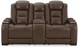 Ashley the man-den pwr rec loveseat/con/adj hdrst in mahogany