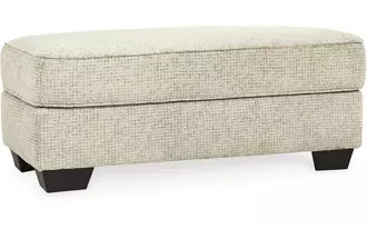 Ashley monaghan ottoman in sandstone
