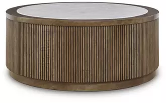 Ashley hadonna round cocktail table in brown