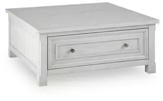 Ashley robbinsdale lift top cocktail table in antique white