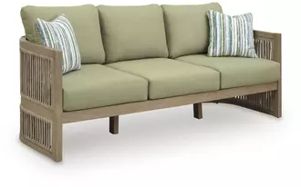 Ashley serena shores sofa with cushion in beige/green