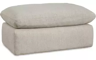 Ashley refined ottoman in sand