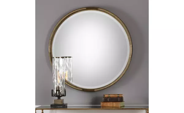 finnick round mirror by uttermost