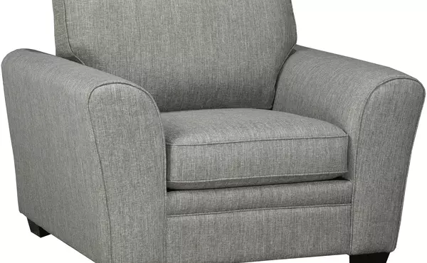 accent chair by sofa by fancy