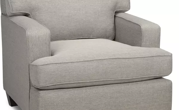 accent chair by sofa by fancy