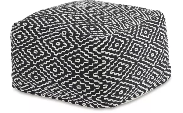 jasett black/ivory pouf by ashley