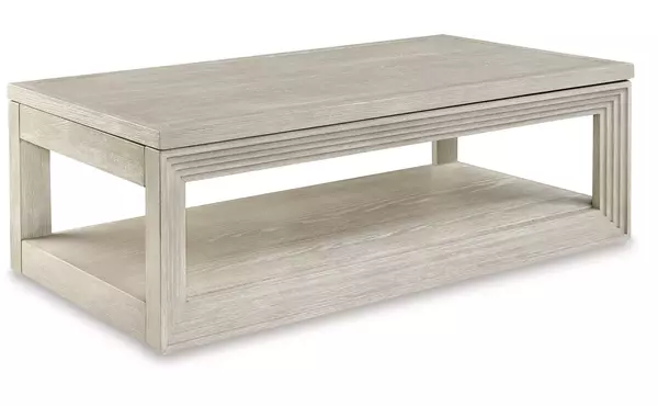 marxhart bisque lift top cocktail table by ashley