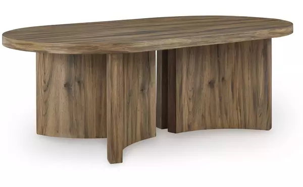 austanny warm brown oval cocktail table by ashley