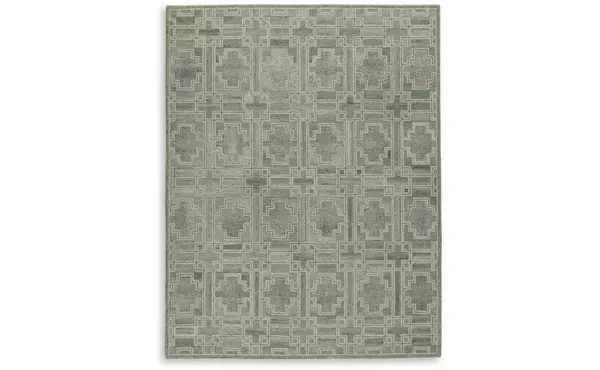 jossland green/ivory large rug by ashley