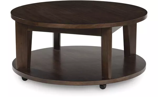 korestone 2 dark brown round cocktail table by ashley
