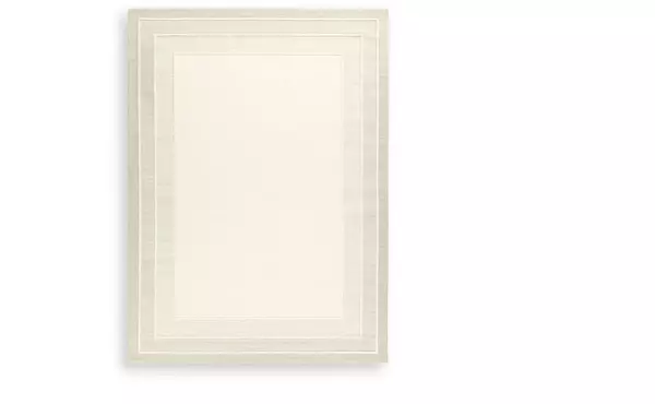 teelgan ivory/tan extra large rug by ashley