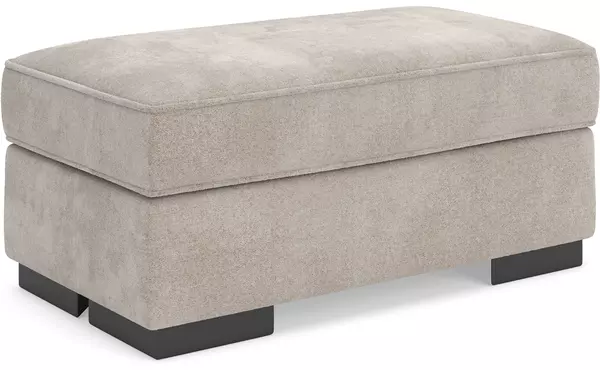 high profile taupe ottoman by ashley