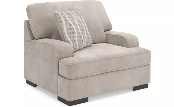 high profile taupe chair and a half by ashley