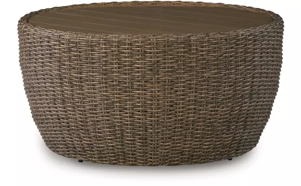 double point beige round cocktail table by ashley