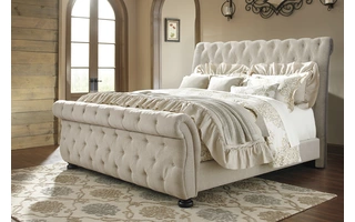 QUEEN UPHOLSTERED FOOTBOARD Willenburg Dark BrownB643-74 ASHLEY